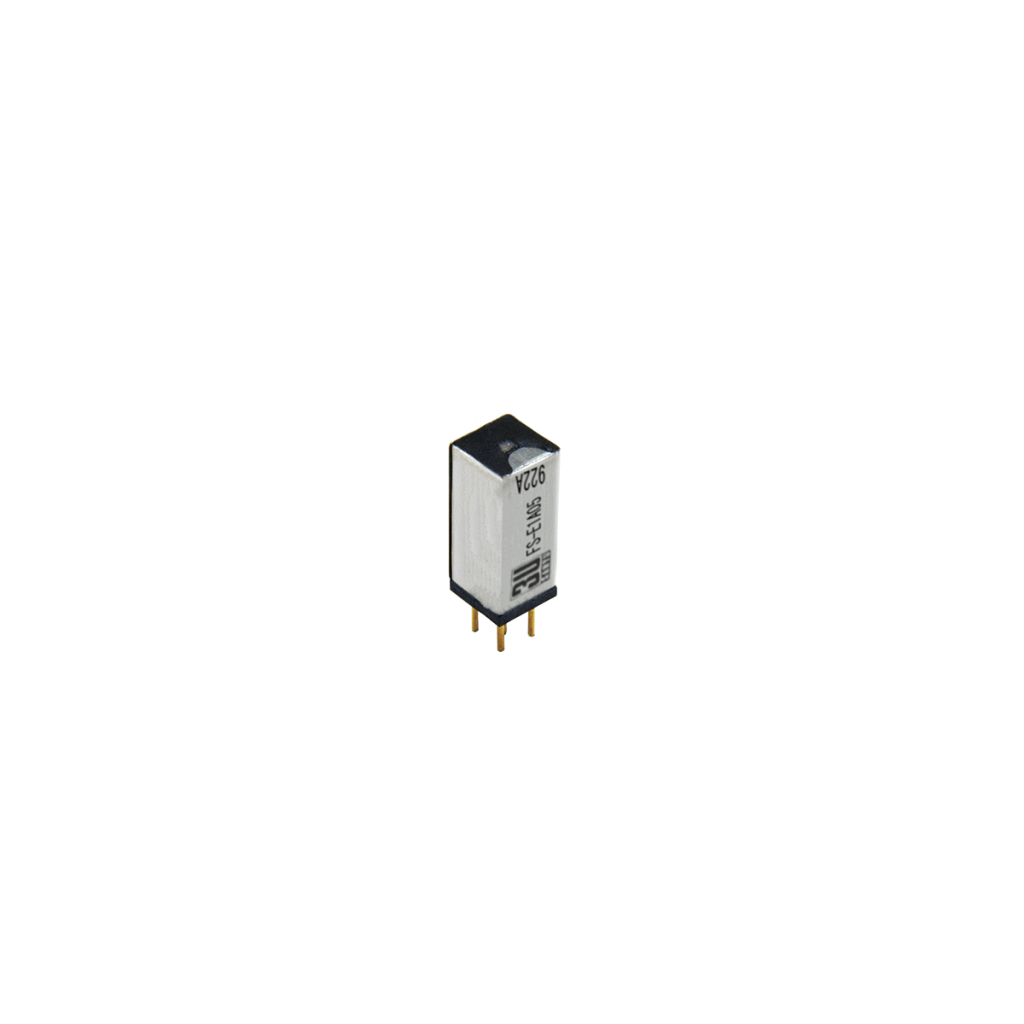 A small rectangular FS Series Reed Relay with a white and black casing, standing upright on three gold pins, isolated on a white background. by Standex Detect