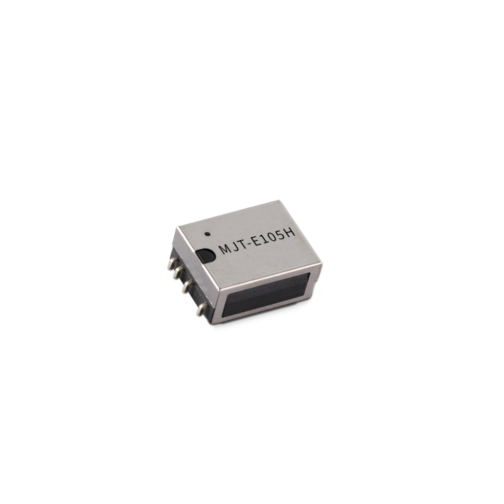 A small, rectangular Reed Relay MT Series component with five metal pins and the label MJT-E105H printed on its surface, placed on a white background. by Standex Detect