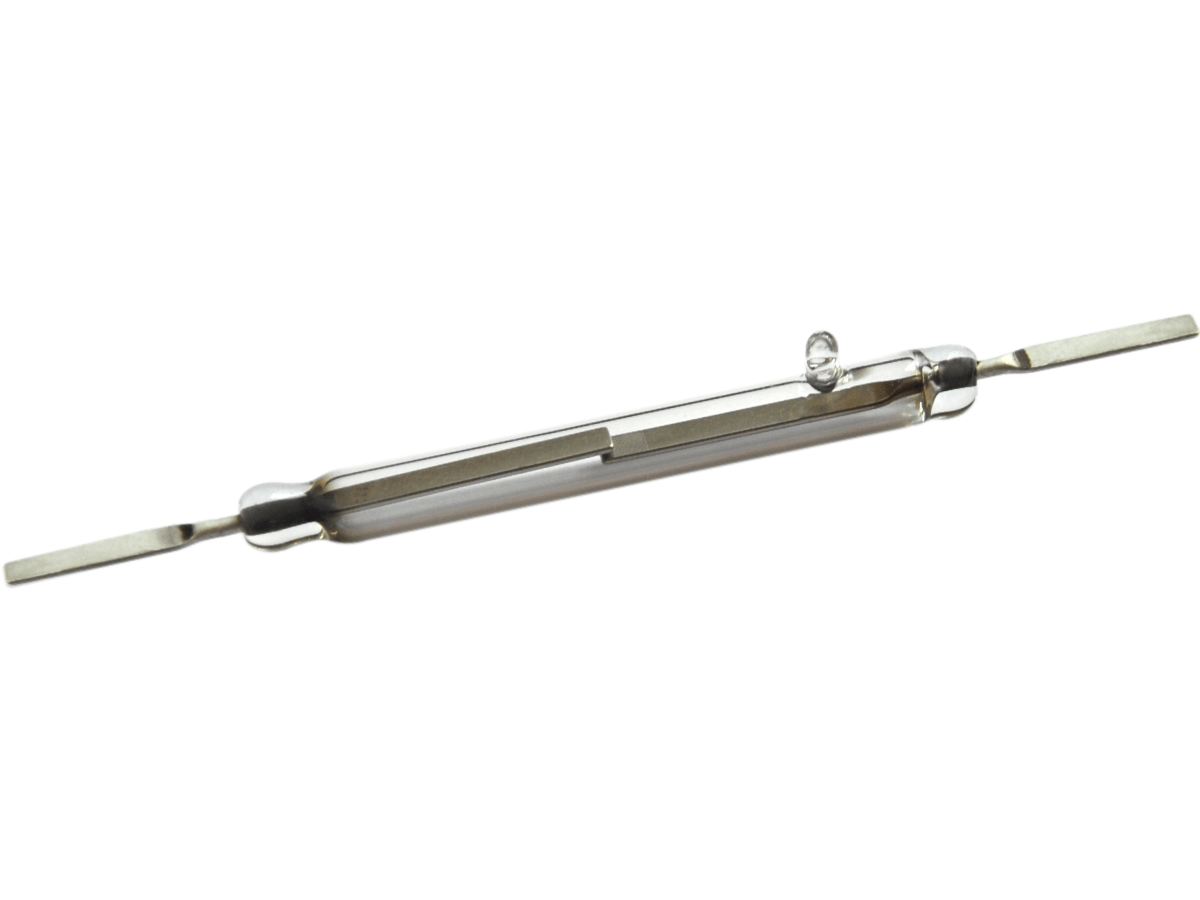 A close-up view of a KSK-1A83 Reed Switch, showing its glass tube body with two metal leads protruding from each end and a visible contact inside the tube. by Standex Detect