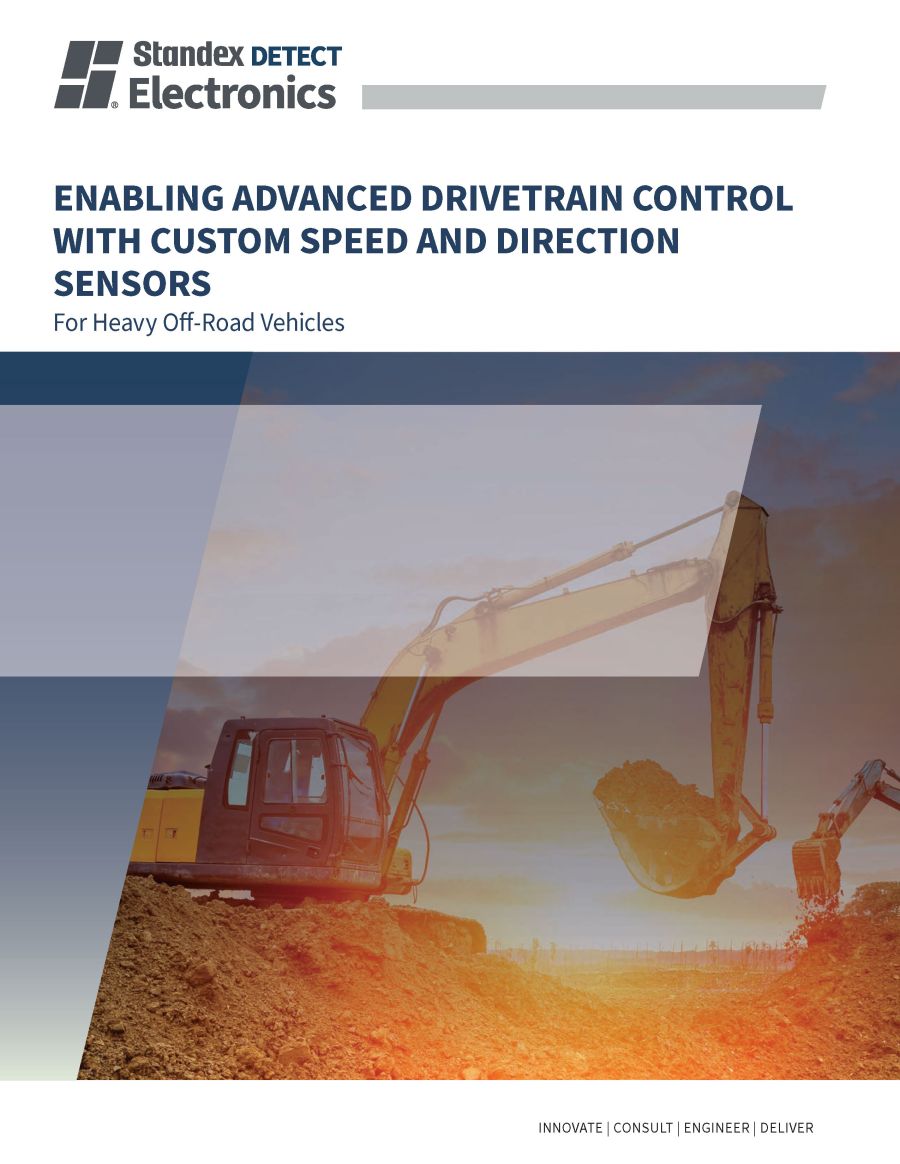 A large yellow excavator digs soil at a construction site, with a blue sky background. Text promotes Standex Electronics advanced drivetrain control and sensors for heavy off-road vehicles. by Standex Detect