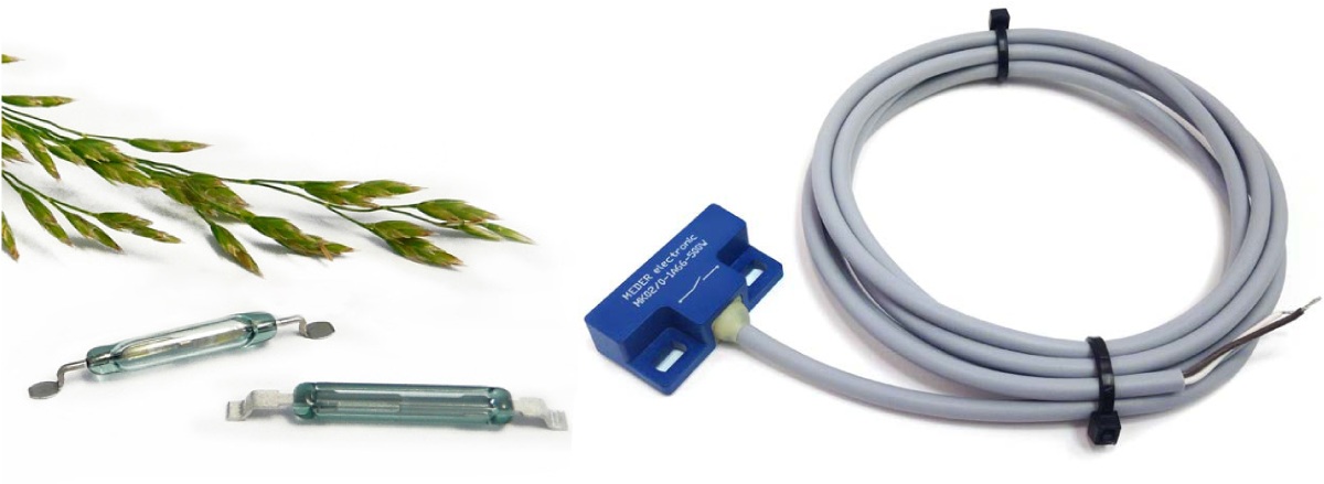 Two glass reed switches lie next to green plant stems (left), suggesting agricultural applications, while a blue Hall sensor with a long gray cable is coiled neatly beside it on the right, both set against a clean white background. by Standex Detect