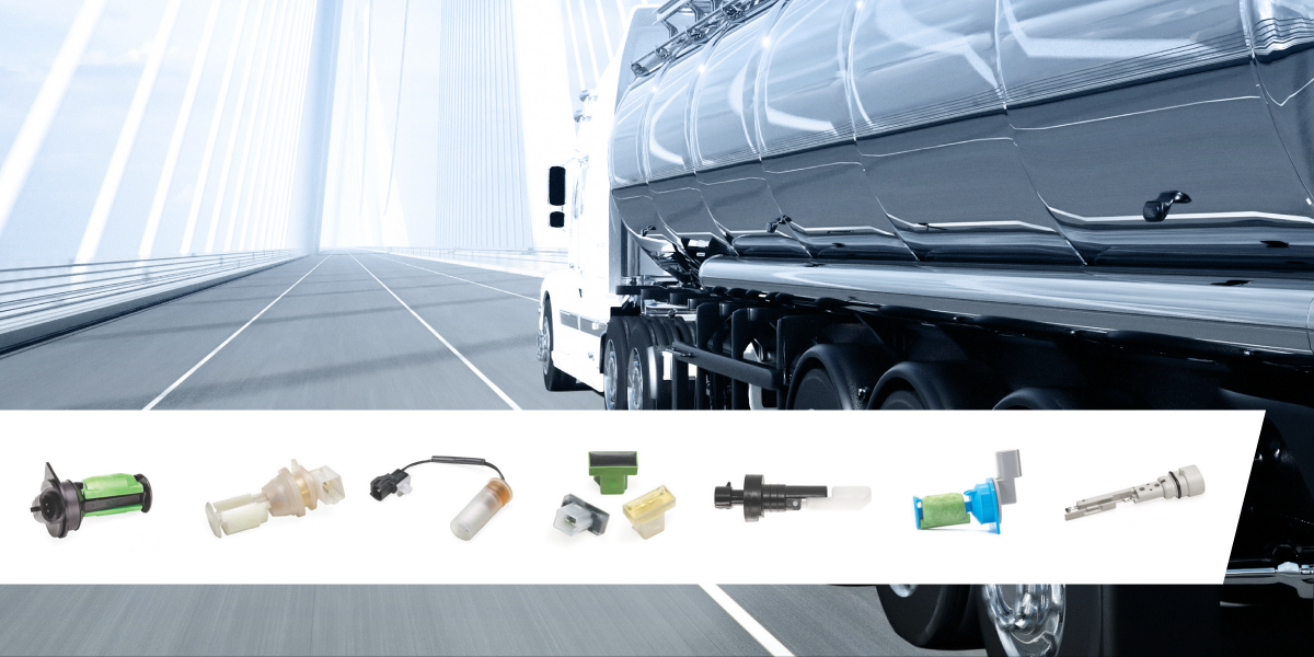 A shiny tanker truck drives across a modern bridge. Below, a row of various automotive fuel system components, including an energy efficient sensor, is displayed against a white background. by Standex Detect