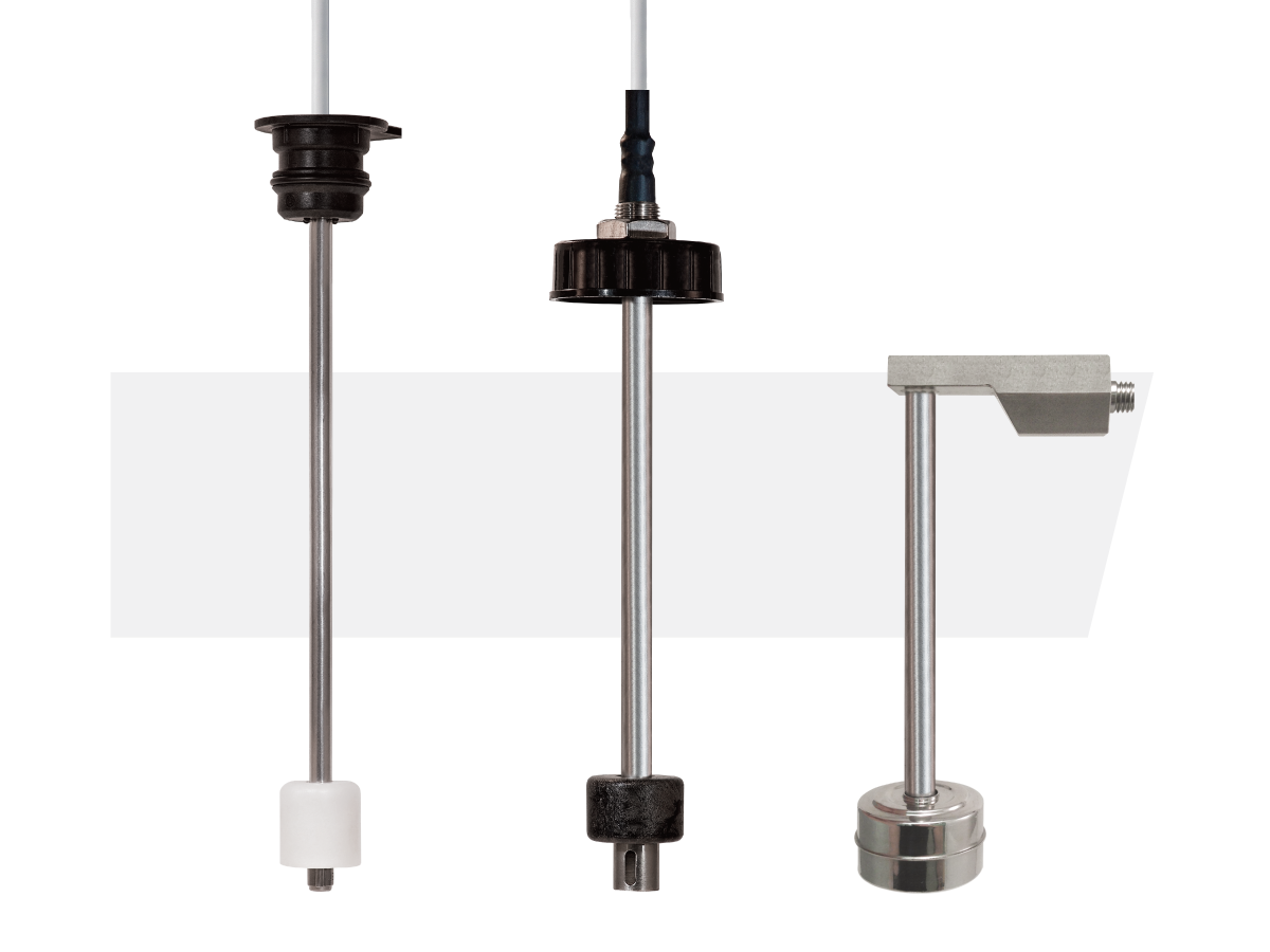 Three energy efficient sensors with metal rods and floating components, each featuring distinct upper fittings, are shown side by side on a white background. by Standex Detect