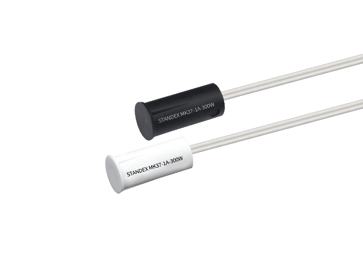 The MK37 Series Reed Sensor is a recessed magnetic sensor that is designed for installation in a ø3/8” hole or in a ø3/4” hole when using an adapter. The sensor is designed for a press fit installation that utilizes crush ribs to retain the sensor in the installation hole as well as a mating magnet to match.
