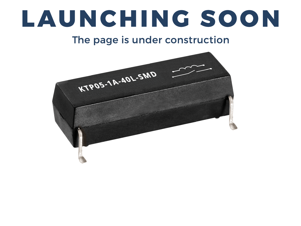 A black electronic component with KT05-1A-40L-SMD printed on it, featuring cutting-edge technology from the KT Series reed relays, is displayed below the text LAUNCHING SOON and The page is under construction on a white background. by Standex Detect